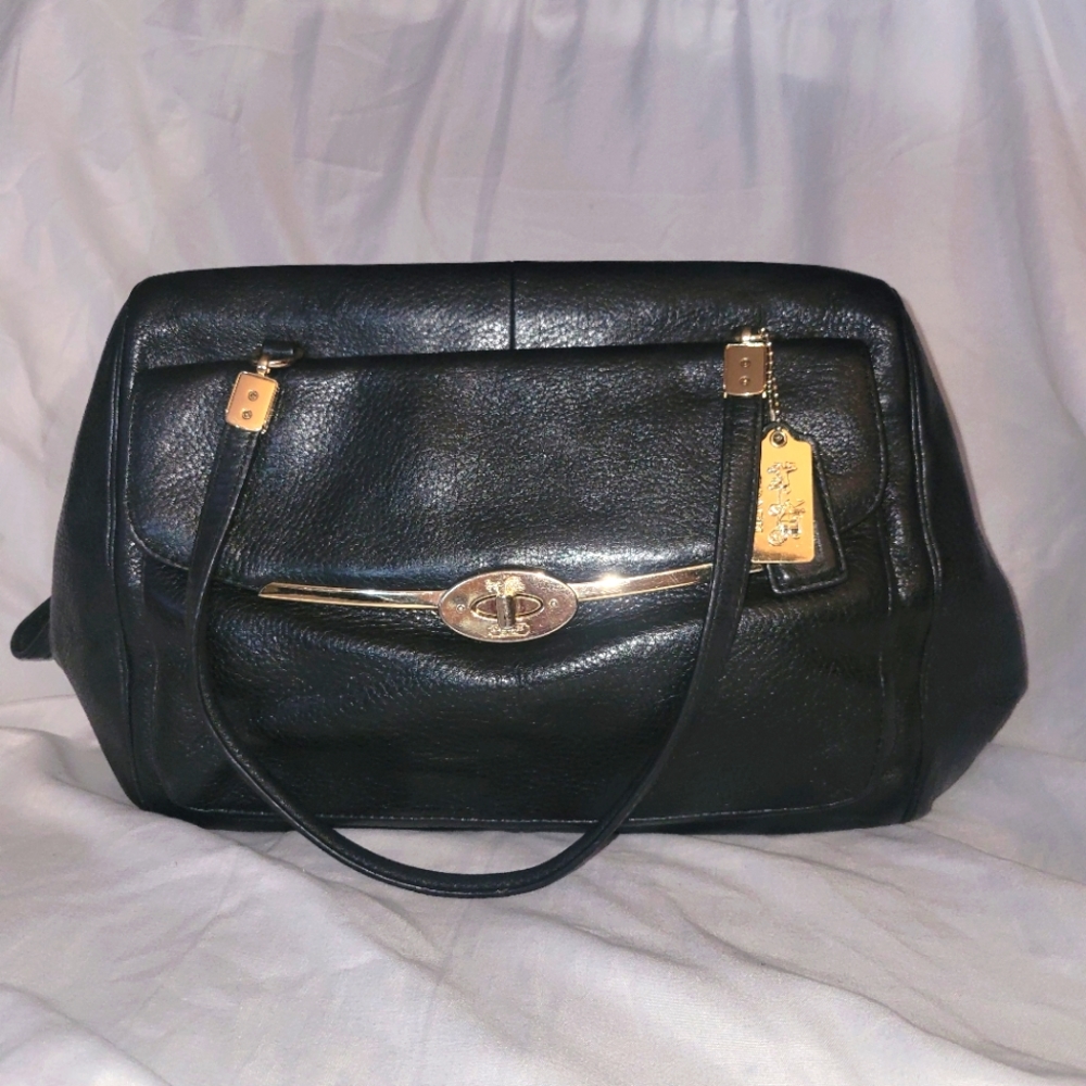 Genuine leather coach handbag.